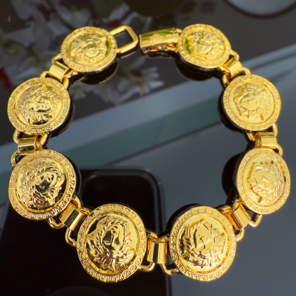 Stunning 24K gold plated Versace vintage Medusa bracelet.